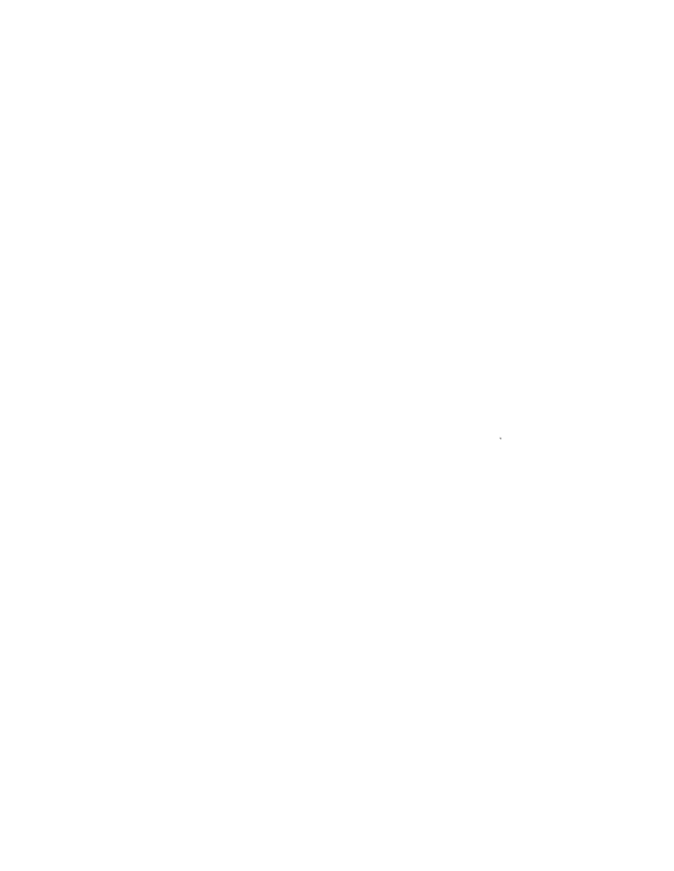 a black and white circular logo with a excavator digging a wall