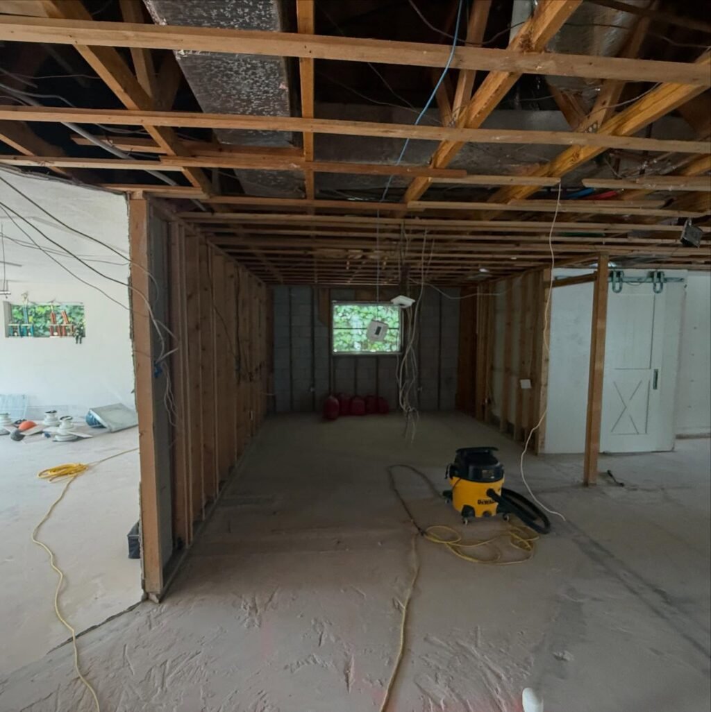 Complete gut in Naples, ceilings, interior walls, outside pavers, columns and concrete.